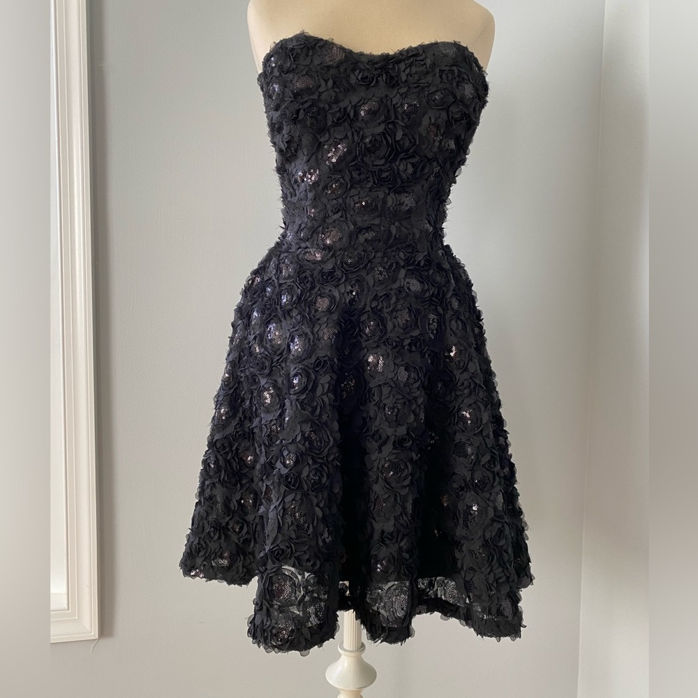 Bebe strapless cocktail dress with floral appliqué
